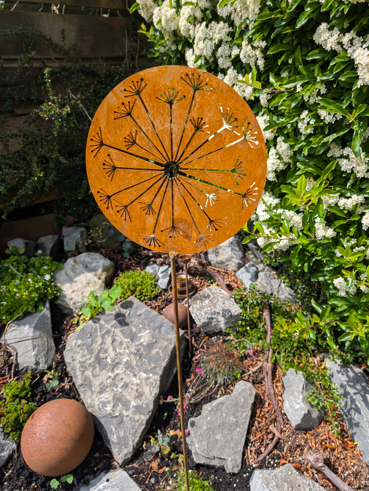 rusty metal flower stake