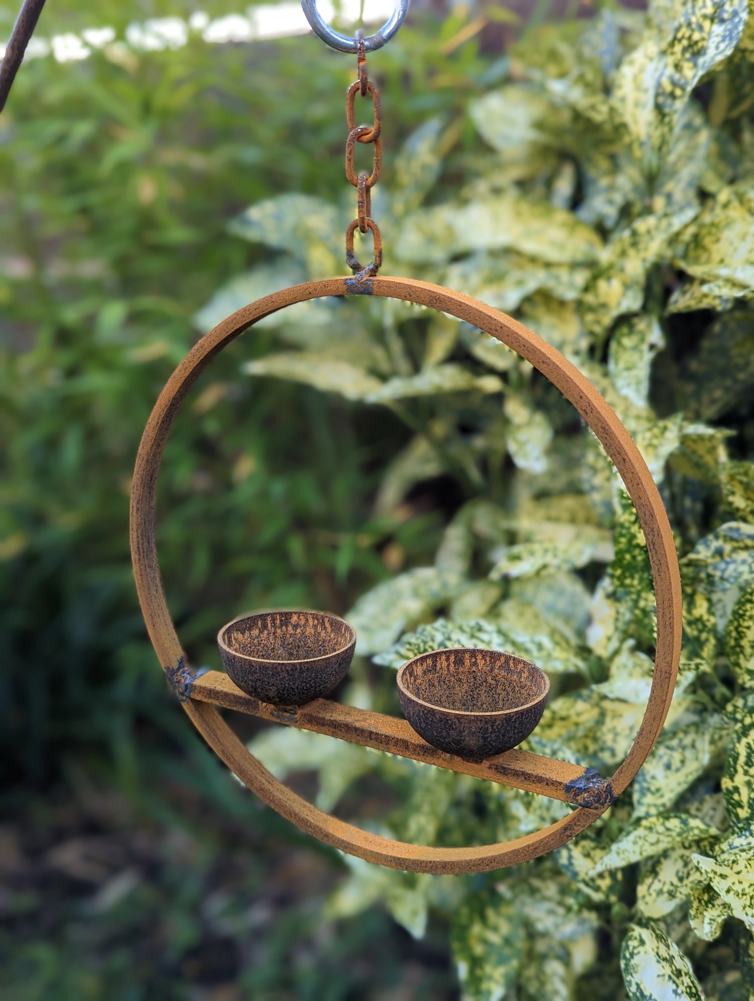 large metal hanging bird feeder